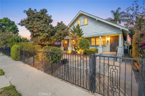 Photo of 1241 E 43rd Pl, Los Angeles, CA 90011 (MLS # RS25258950)