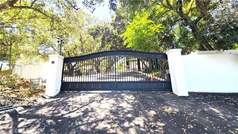 Photo of 11825 West Trail, Sylmar, CA 91342 (MLS # GD26051751)