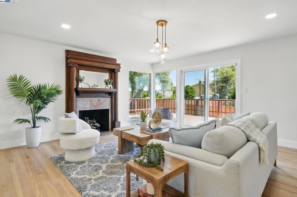 Exquisitely remodeled and ideally situated in the serene May Valley neighborhood, this single-family home offers the perfect blend of style, function, and comfort. Originally built in 1956, the home spans 1,763 square feet on a generous 6,000-square-foot lot. The ideal floor plan features three bedrooms and two bathrooms upstairs, with a versatile den and full bathroom on the lower level—perfect for a home office, guest space, or playroom. The spacious primary suite boasts an en-suite bathroom and two closets, offering both comfort and convenience. Enjoy the practicality of an attached two-car garage and a partially finished basement, providing ample storage and added flexibility. Step outside to a gorgeous deck perched above the neighborhood, where sweeping views of the rolling East Bay hills create the ultimate outdoor retreat. Whether you’re sipping morning coffee, entertaining guests, or watching the sunset, this peaceful vantage point invites indoor-outdoor living at its best. Set in a quiet, dog-friendly community known for its well-kept yards and welcoming vibe, this home offers a rare opportunity to live in a tranquil neighborhood.