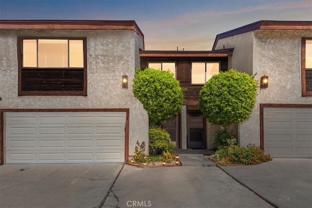 WELCOME to this beautiful two-story townhome in Monrovia. The open living area flows easily into the kitchen creating a welcoming space. Upstairs, the bedrooms are bright and comfortable, with natural light throughout. Step outside to a private patio, perfect for relaxation, and an attached garage adds everyday convenience. Ideally located close to Old Town Monrovia, dining, shopping, schools, and transportation.