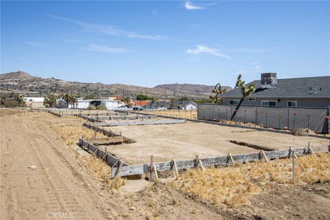 Photo of 57405 Primrose DR, Yucca Valley, CA 92284 (MLS # JT26079713)