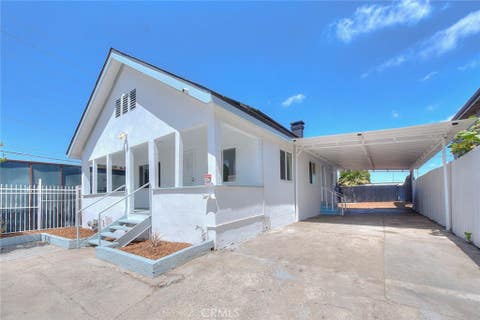 Photo of 5506 Holmes Avenue, Los Angeles, CA 90058 (MLS # DW26145100)