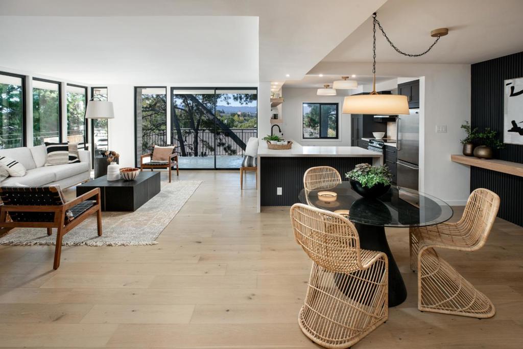 Stunning Condo in Downtown's Most Iconic Mid-Century Building. Enjoy Sunset views from this truly special home located in Everett House, a 6-story,16-unit mid-century modern beauty standing perfectly preserved amidst Palo Alto's evolving landscape. A building like this simply would not be built today. Residence 5B is spacious, private, elegant, w/ large deck, ample storage, and remodeled throughout. This home boast a superior location in the complex w/no units above the living space and unobstructed views reaching to Stanford campus and the hills beyond. Two very large bedrooms PLUS bonus room-perfect for home office, nursery, gym. Fantastic master suite has floor to ceiling windows. Remodeled bathrooms are gorgeous, w/ imported tiles, fixtures, stunning Thassos marble. Building boast large grounds, dramatic oversized lobby, large swimming pool, cabana. OWNERS PAY NO UTILITIES- ALL INCLUDED IN HOA