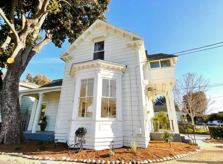 This beautifully updated late 1800s home blends historic charm with modern living and offers duplex potential with its multi-family zoning. The remodeled kitchen, featuring stainless steel appliances and quartz countertops, opens to a standout butlers pantry. Equipped with its own sink, counter space, and storage, the pantry is ideal for meal prep, entertaining, or a stylish coffee bar, adding rare convenience and sophistication. The home boasts new wooden floors, updated wiring and plumbing, fresh paint inside and out, and a fully remodeled downstairs bathroom. The laundry area includes a new LG washer and dryer. Upstairs, you'll find two bedrooms and a cozy sunroom, perfect as an office or retreat. With 3 bedrooms, 2 bathrooms, drought-resistant landscaping, new fencing, half a new roof, & a new driveway to a storage area, this corner-lot property is move-in ready. Situated on a quiet road near the Kaiser Permanente Arena, West Cliff Drive, the Wharf, and downtown Santa Cruz, its also close to new developments, expanded housing, and river connections. This gem offers historic charm, modern updates, and investment potential in a vibrant community. Note: Flexibility as a Single Family Residence or Duplex with separate meters & addresses! New Tankless Water Heater installed.