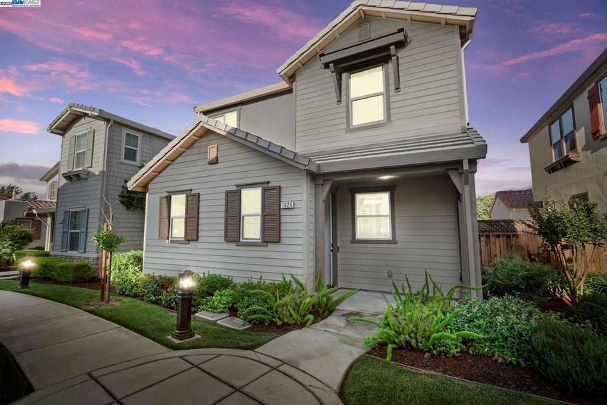 Welcome to this GORGEOUS 4 BR, 3 BATH, LOFT INCLUDED, Solar Equipped, 2 CAR GARAGE property in HANSEN VILLAGE spans 2,274 SQ FT & SITS ON A 3,890 SQ FT LOT with a landscaped backyard. BUILT IN 2016, Designed for comfortable living & Entertaining as the 1st floor comes with a Bedroom & full Bath with walk-in closet . Easy to host family & guests. Living area comes with a OPEN FLOOR PLAN THAT SEAMLESSLY BLENDS THE GOURMET KITCHEN, DINING AREA, & LIVING ROOM. Modern kitchen comes with GRANITE COUNTERTOPS, SLEEK STAINLESS STEEL APPLIANCES, A LARGE ISLAND, AND STYLISH ESPRESSO STAINED CABINETS. Upstairs, you’ll find LARGE LOFT , 3 BR, 2 BATH & Laundry room. Each room comes with ceiling fans & recessed lights. Primary suite boasts a luxurious en-suite bath featuring a large soaking tub, separate shower, his and her sink & walk-in closet . Smart blinds have been installed in the primary suite and loft. Garage comes with a charging outlet, built in cabinets, and an additional refrigerator. The completed backyard is your private sanctuary offering a large patio space, a sprinkler irrigation system & mature fruit trees perfect for playing, relaxing & entertaining. It’s walking distance to Mountain House High , a 2024 National Blue Ribbon School & award-winning Hansen Elementary School.