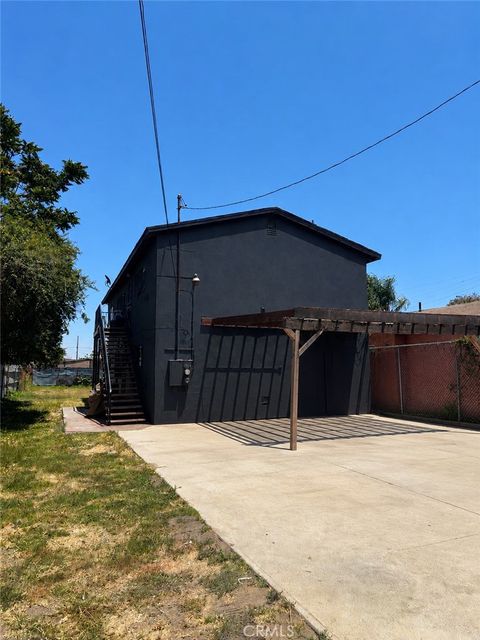 Photo of 10974 Willowbrook Avenue, Los Angeles, CA 90059 (MLS # PW26145862)