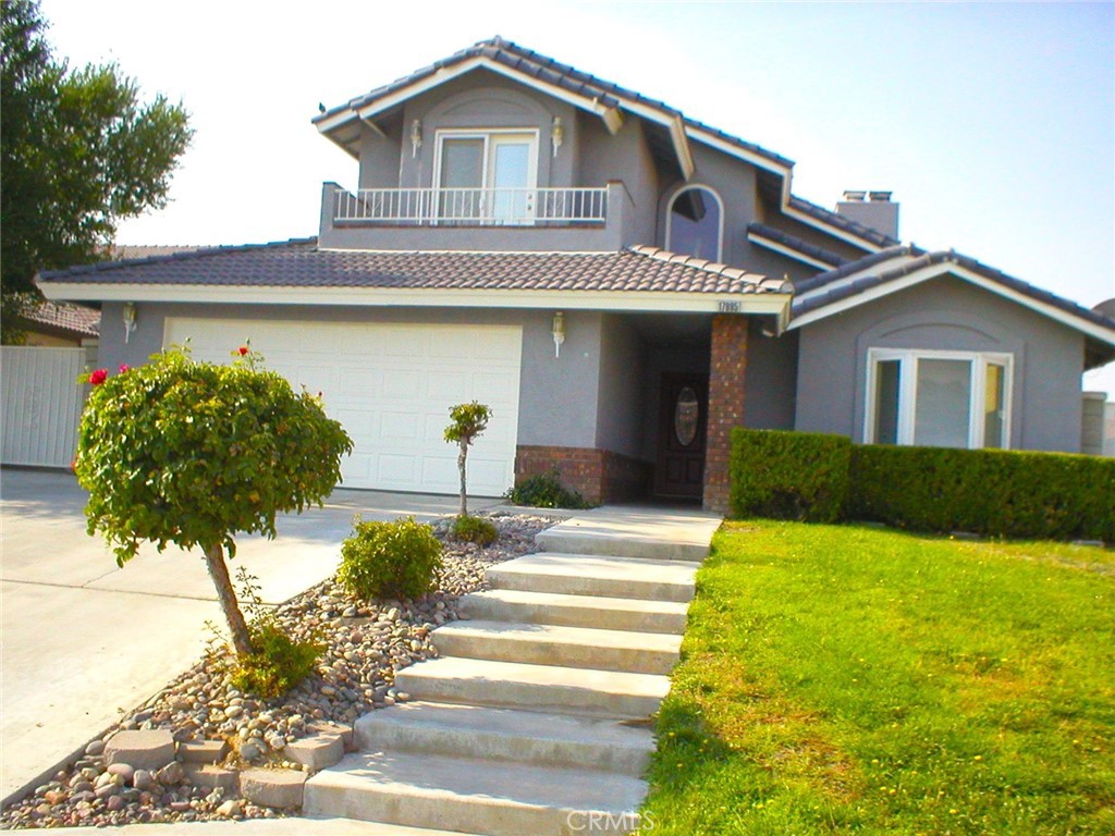 Your home is located in Spring Valley Lake on a cul-de-sac. The square footage of this home is 2,552. There is a down stairs bedroom, and a full bathroom down stairs. Total of 3 bathrooms. Formal dining room and Living rooms. Large Family room off of the kitchen, with a wet bar, and Fireplace. The kitchen has an Island counter for additional storage and sitting area. Kitchen nook in the kitchen. (Eating area). Your huge Master Bedroom has a additional fireplace, room for a sitting area, and king size bed. The master bathroom has a separate tub add shower. Large walk in closet. 2 additional bedrooms upstairs, with additional hall full bathroom. The one additional bedroom has a built in desk and a small balcony. The Master Bedroom has a nice size balcony with direct access from the bedroom. 2 Car attached garage accessing into the home. Lot size is 8,400. Back yard is spacious. You love this home.