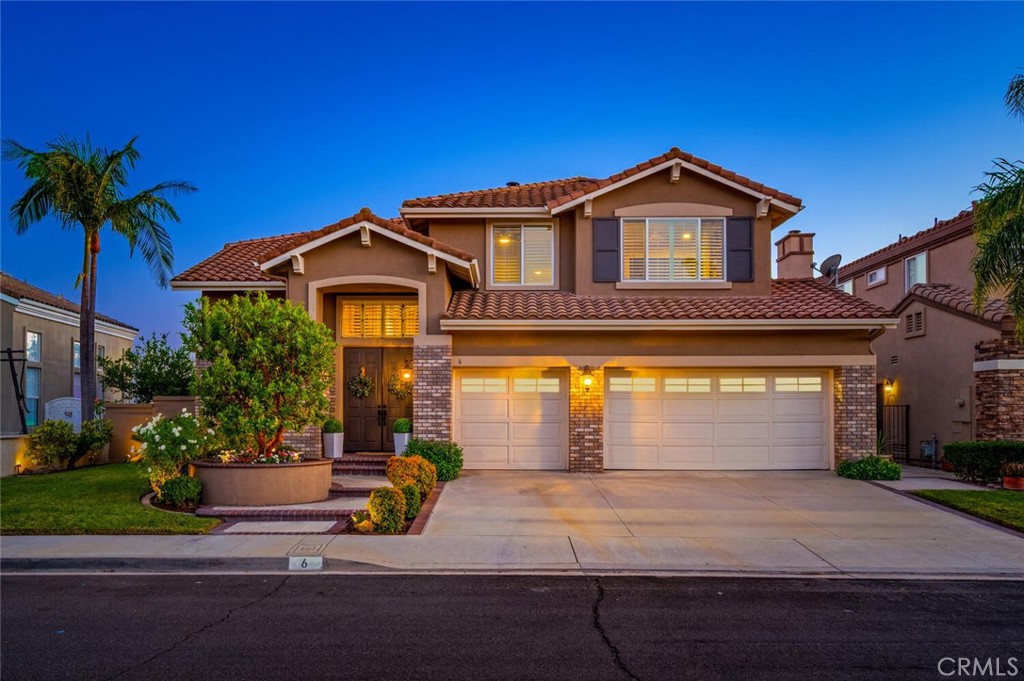 Welcome to this STUNNING HOME located in the highly desirable Melinda Heights neighborhood of Rancho Santa Margarita. Beautifully upgraded throughout, this home is an entertainer’s paradise, offering the perfect blend of elegance, comfort, and functionality.
Step inside to discover a thoughtfully designed, open-concept layout that flows effortlessly from room to room. At the heart of the home is a CHEF'S KITCHEN featuring high-end appliances, generous counter space, and seamless access to the dining and family areas, ideal for hosting gatherings or enjoying quiet evenings.
The versatile FIRST FLOOR BEDROOM and full bathroom offer a private retreat for guests or multigenerational living. Upstairs, you'll find a spacious LOFT that delivers endless possibilities, perfect for a media room, game room, or an inviting lounge area. Whether you're entertaining guests or seeking a quiet retreat, this flexible space adapts beautifully to your lifestyle. A spacious 3 CAR GARAGE provides ample storage and convenience for busy households.
The private backyard oasis invites you to relax under the stars, complete with an above-ground spa for ultimate comfort and tranquility. Additional upgrades include a WHOLE HOUSE RE-PIPE, wine fridge, built-in coffee maker, ice machine, steamer, warming trays, built-in surround sound, putting green and so much more.
Located just minutes from O’Neill Wilderness Park, shopping, dining, and the 241 Toll Road, this home offers both convenience and connection to nature and city life. Residents enjoy access to low cost HOA amenities, including pools, tennis and pickleball courts, RSM Lake, the Beach Club, and scenic trails.
Experience the pinnacle of Southern California living—where luxury meets lifestyle in one extraordinary home.