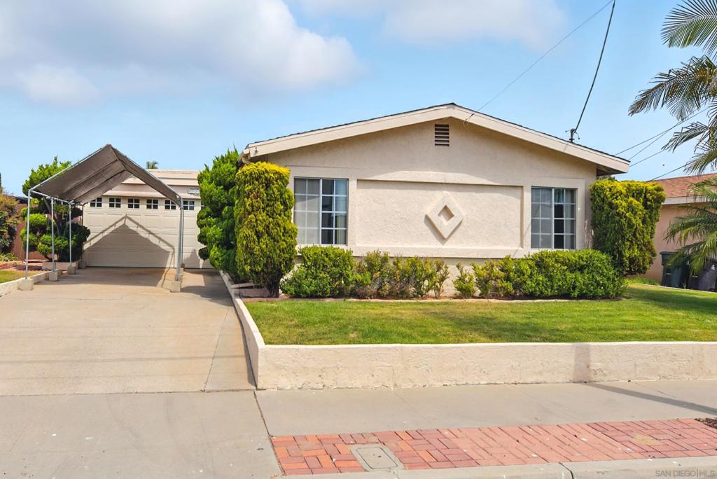 Welcome to this charming 3-bedroom, 2-bathroom home in Chula Vista! From the moment you step inside, you’ll be drawn to the inviting living room, complete with a cozy stone fireplace and beautiful wood beam ceiling that give the space so much character. The kitchen and dining areas flow easily for everyday living, and the bedrooms offer comfort and plenty of natural light. Out back, you’ll find a spacious yard with mature greenery and a covered patio—perfect for barbecues, morning coffee, or simply relaxing outdoors year-round. The attached 2-car garage includes a built-in workstation and storage, while the extended covered driveway parking provides even more flexibility for vehicles, hobbies, or projects. Set in a convenient location close to shopping, dining, and schools, this home balances comfort, function, and charm.