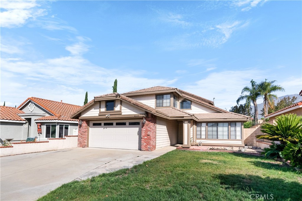 Welcome to this beautifully upgraded home nestled in one of Rancho Cucamonga’s most desirable neighborhoods. Boasting an open and airy floor plan, this residence is designed for modern living. Elegant hand-scraped wood flooring flows throughout the main living areas, complemented by custom wrought iron bannisters, recessed lighting, and a freshly painted interior that enhances the home’s bright, natural lighting. The spacious kitchen features sleek stainless steel appliances, perfect for culinary enthusiasts, and opens seamlessly into a generously sized family room highlighted by a charming brick fireplace. French doors provide easy access to the backyard, blending indoor and outdoor living. A downstairs bedroom with a private bathroom and walk-in shower offers flexibility for guests, extended family, or a comfortable home office. Located in an award-winning school district, this home combines style, functionality, and top-tier education—all in a highly sought-after community.