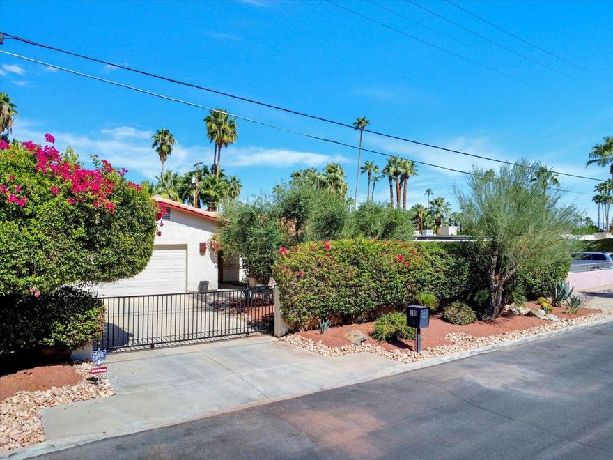 This PRIDE of ownership home is well-priced and move-in ready. A contemporary kitchen, three bedrooms, and two bathrooms make this an easy lifestyle choice. Three sliding glass doors open from the LARGE GREAT ROOM to a classic, Hollywood-style POOL with MOUNTAIN VIEWS set amidst mature landscaping.  On the whole, this alone is a showstopper. One guest bedroom has a separate entrance that makes this a perfect home office where visitors may come and go without disturbing the rest of the house. TWO-CAR GARAGE, plus two-car driveway. Whole house ''Life Source'' water system purchased and installed virtually eliminates hard water entering the home or pool. Double-pane windows throughout. Walk, bike, or drive to nearby local favorites like El Mirasol, Mr. Lyons, Koffi South, Townie Bagels, or even go the mile and a half to be downtown in a snap! This is a FANTASTIC LOCATION for the year-round resident, the seasonal renter, or the short-term vacationer who wants to be close to all this great stuff.