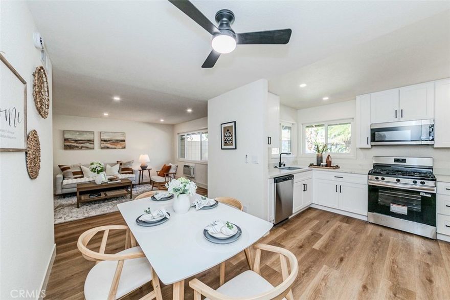 Experience modern living in this fully renovated single-level condo in the sought-after Coco Palms community of Fullerton. Featuring 2 spacious bedrooms, 2 beautifully upgraded bathrooms, and 936 square feet of stylish living space, this move-in ready home is perfect for first-time buyers, downsizers, or investors seeking comfort and convenience.



Step into a bright, open-concept layout enhanced with recessed lighting, new laminate wood flooring, and ceiling fan lights in the dining area and each bedroom. The stunning new kitchen showcases Quartz countertops, custom cabinetry, stainless steel appliances, a sleek stainless-steel sink, and a modern faucet—ideal for everyday cooking and entertaining.



The bathrooms are completely transformed with elegant finishes, including a new bathtub with a frameless glass enclosure, a walk-in shower in the primary suite, and contemporary vanities and fixtures. Enjoy year-round comfort with central heating and a wall-mounted A/C unit. A detached one-car garage provides added storage and parking convenience.



Residents of Coco Palms enjoy beautifully maintained landscaping and access to a refreshing community pool. This prime location is just minutes from Downtown Fullerton, Cal State Fullerton, and the highly acclaimed Troy High School.



Move right in and start enjoying this turnkey home that blends style, comfort, and location—schedule your private tour today!