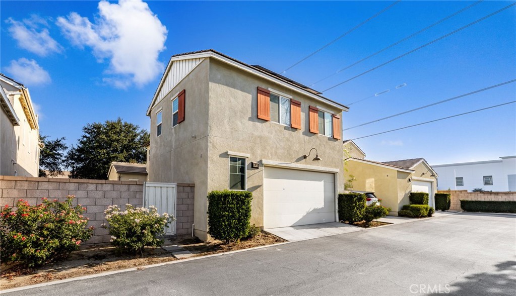 Welcome to EDENGLEN in Ontario Ranch - This is a BEAUTIFULLY UPGRADED Home with ONE of the Largest Backyards in the Community and Has an OVER-SIZED 2 Car Garage!! Family Friendly Community with LOW HOA Fees, NO SOLAR Payments and ALL the Amenities EDENGLEN has to Offer!! Enjoy this OPEN Concept EXPANSIVE Floor-Plan Offering 1900sqft with 3 LARGE Bedrooms and 2.5 Bathrooms * * EXTRA LARGE Living Room with Gorgeous Wood Laminate Flooring Throughout * * Terrific ISLAND KITCHEN with GRANITE SLAB Counters & Back-Splash, Breakfast Counter for the Kids, STAINLESS STEEL APPLIANCES, In-Kitchen Dining and Walk-In Pantry * * Spacious Backyard is PERFECT for Family Gatherings, Private BBQs and Plenty of Room for your Kids to Play * * UPGRADED Throughout with DESIGNER FIXTURES, Raised Panel Decor Doors, Wood Laminate Flooring, PLUSH Carpeting, NEWER AC Unit, PAID-FOR Solar Panels by Tesla, Granite Counters, NEW TANKLESS WATER HEATER and MUCH MORE * * SPACIOUS Primary Bedroom with LARGE Walk-In Closet - AND - Primary Bathroom with DUAL Sinks, Corian Counters, Walk-In Shower and Romantic Garden Tub * * TWO Additional Nicely Appointed Upstairs Bedrooms * * UPSTAIRS Laundry Room * * OVER-SIZED 2 Car Attached Garage * * Nice Curb Appeal with Covered Front Porch with 2 Car Attached Garage * * ENJOY all the Amenities with SPARKLING Community Pool & Spa, Outdoor BBQ/Cooking Area, Playground for the Kids, Dog-Park, Basketball & Tennis Courts and Vibrant Community Atmosphere with Holiday Activities including Movies in the Park, Easter Egg Hunt, 4th of July Celebrations, Friendsgiving, Winter-Tree Lighting Ceremony and Halloween Costume Contests for the Kids and Your Furry Friends * * Close to Schools, Shopping, GOLF, Dining/Restaurants, Parks, Ontario Airport, Victoria Gardens, Ontario Mills and EZ Freeway Access * * SUBMIT ALL OFFERS!!!
