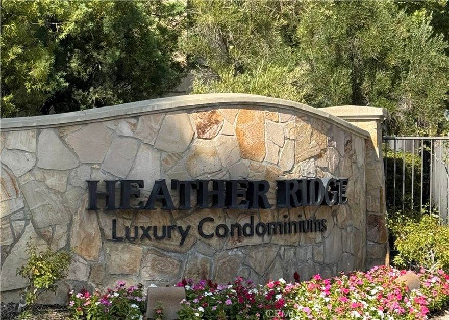 Welcome to the Beautiful Prestigious Luxury Gated Community of Heather Ridge offering a 2 bedroom, 2 bath corner unit Condo with 1216 square feet of spacious and open floor plan. This home condo comes equipped with stainless steel appliances that includes Gas Range, Microwave, Dishwasher, Refrigerator and garbage disposal. Living room showcases newly renovated fireplace and is open to the kitchen area. Recessed lighting through out, Ceiling Fans in every room, wood shutters in the bedrooms and a private balcony with extra storage room. Washer and Dryer space side by side in its own area.The Master Suite is a peaceful retreat with an en-suite bathroom with double sinks and a private potty room as well as a big walking closet. This unit includes a 2 car garage with direct entry into the home. The amenities in this community include a sparkling pool, spa/Hot Tub, BBQ, Tennis Court(s) and Basketball Court. This condo just got a new refreshed look and is ready for the right person to move right in. Close proximity to 14 Fwy, shopping, entertainment and dining.