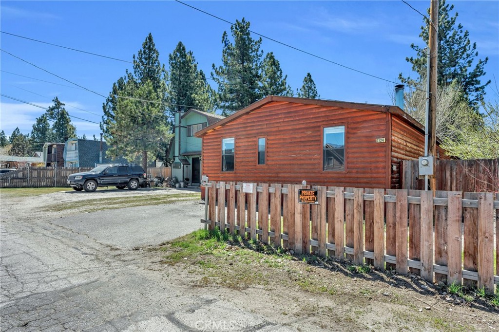 Charming 3-bedroom, 2-bathroom property with manufactured wood log siding, nestled in the heart of Big Bear City. Conveniently located close to everything, within walking distance to the Convention Center and Reserve Lake, and just minutes from Snow Tubing and Snow Play Area, the ski resort, and Big Bear Lake.
The house features an open-concept living area, dining area, and kitchen, with hickory engineered floors throughout. It also boasts a huge deck made from redwood, perfect for outdoor enjoyment. The property is being sold with custom furniture, although some pieces are excluded. This home has been a successful short-term rental for many years, boasting high ratings. This is property qualify for FHA loan with min down payment