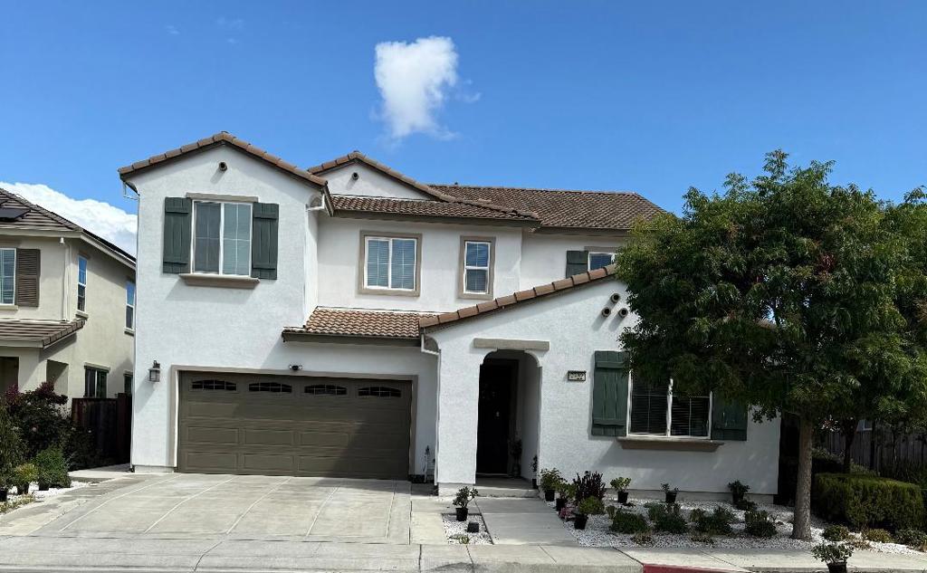 Stunning Bdautiful Heartland Home in Gated Community. 3008 SF, 5 Spacious Bedrooms with walk in closets and 4 1/2 Bathrooms. Upstairs features the laundry room W/ Washer and Dryer included. An Upstairs Open Loft Area for a Separate Family Room, Playroom, or Office Space. Downstairs features a Full Bedroom and Private Bathroom for Guests or Family, Large Open Kitchen w Stainless steel appliances-Gas Cooktop, Oven, Microwave, and Hood, Granite Counter Tops, Huge Island w Sink and Breakfast Bar. Epoxy Painted 3 car garage with custom cabinets. Private Rear Yard with Stump concrete and palm trees. All in a Gated community Setting with Walkways throughout and exit and entry gates around the perimeter. Community is Adjacent to miles or paved Biking/Walking Trails, Kids playground, and Large Lawn Areas as well.