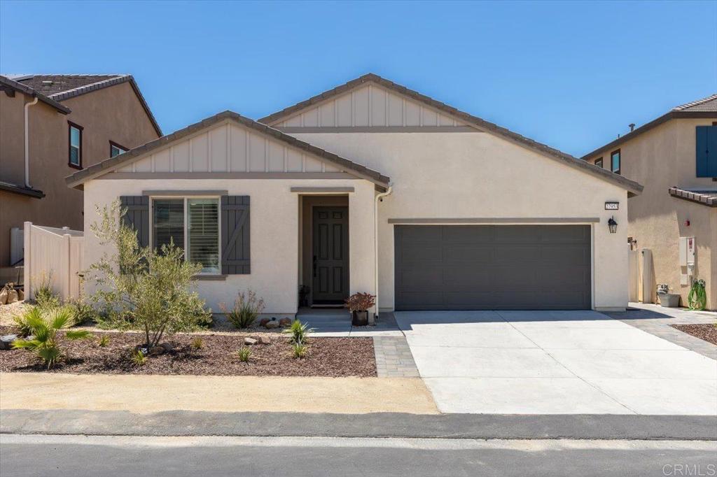 Welcome to modern living in the heart of Valley Center’s vibrant Park Circle community. Located on a cul-de-sac, this stunning single-story home offers 3 bedrooms plus a dedicated office, 2 bathrooms, and an open-concept layout designed for effortless everyday living and entertaining. Built in 2023, the home features sleek luxury vinyl plank flooring in the main living areas, recessed lighting, and plantation shutters throughout for a polished, cohesive look. The spacious kitchen is a true centerpiece, showcasing a large center island, stainless steel appliances, quartz countertops, ample cabinetry, and a pantry—perfect for preparing meals while staying connected to guests in the open dining and living space. The thoughtfully designed layout includes a versatile office and a private laundry room for added convenience. Step outside to a private outdoor space with a putting green, ideal for casual fun and sunny afternoons. Additional highlights include owned solar for energy efficiency and low utility bills, plus an attached garage with ample storage. As part of the Park Circle community, you’ll enjoy access to resort-style amenities across three distinct areas: The Hangout with a pool, fitness center, and outdoor living room The Lookout featuring a second pool, sports courts, and a playground The Back Porch offering dog parks, sports courts, and a casual outdoor patio Whether you're upsizing, downsizing, or just starting out, this move-in-ready gem offers comfort, style, and the best of community living.