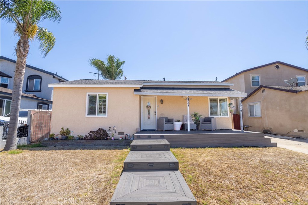 Charming Updated Home in the Heart of Hawthorne. Welcome to this beautifully maintained single-story home offering the perfect blend of comfort, style, and functionality. This residence is move-in ready with thoughtful updates throughout. The welcoming front porch is perfect for morning coffee or evening unwinding. Inside, you’ll find a bright and inviting floor plan featuring multiple bedrooms, stylishly renovated bathrooms, and wood-look flooring that flows seamlessly through the home. The modern kitchen is a true centerpiece with sleek gray cabinetry, stainless steel appliances, quartz countertops, a wine fridge, and an expansive island with seating for four, perfect for gatherings and entertaining. The bedrooms are well-sized and versatile, including a master suite with its own private bath, a secondary bedroom with built-in desk and loft bed setup ideal for kids or home office use, and additional rooms designed with comfort in mind. Each bathroom is tastefully remodeled with contemporary tile work, modern vanities, and updated fixtures. Step outside and enjoy a spacious backyard designed for both relaxation and fun. The large patio cover creates a shaded outdoor living space, perfect for weekend BBQs or evening gatherings. The detached garage offers additional storage or potential ADU possibilities, while the extended driveway provides ample parking for multiple cars or an RV. Additional highlights include updated recessed lighting, ceiling fans, stylish finishes throughout, and an excellent central location near freeways, shopping, schools, amenities, LAX, and SoFi Stadium, Inuit Dome and the beach. REMEMBER to view the home's video tour.