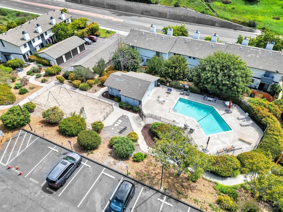 Very clean, move in ready turnkey 3br condo with pool! Tucked away in a peaceful community, this beautifully designed 3-bedroom, 2.5-bath townhome offers the perfect balance of comfort and convenience. The inviting living room features a gas fireplace, creating a warm and welcoming ambiance. The kitchen and dining room have plenty of glass to let in natural sunlight. Upstairs, the primary suite boasts its own private balcony- a quiet retreat to start or end your day with plenty of light and views. Outside, one of the largest patios in the community provides the perfect setting for entertaining or unwinding in the fresh air. Additionally, the property features an in-unit laundry room with washer and dryer. Enjoy access to a sparkling community pool just steps away. Parking is a breeze with a one car garage AND one additional assigned parking spot! Plus, the HOA takes care of trash, sewer, and common area maintenance for easy, stress-free living. A fantastic opportunity in a prime location with easy freeway access, nearby malls, golf courses, and cute coffee shops in Bonita as well - this is one you won’t want to miss!
