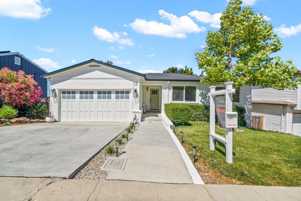 With an enticing view of the bay, this 5-bed 3-bath home located on a quiet cul-de-sac comes with lots of updates including residental fire sprinklers. The large open concept living room connects to the kitchen and upper deck with views of the bay. The expansive kitchen boasts an island, stainless-steel appliances including a 5 burner gas Bosch range and a brand new Whirlpool refrigerator. The primary bedroom opens to the deck with an en suite bath sporting brand new vanities, mirror and lighting. Two additional bedrooms and an additional bath with a bathtub complete the upper level. The lower level includes a large living space that opens to the backyard, two more bedrooms, a large bath with tub and a laundry/utility room. The backyard includes a shaded patio, plenty of gardening space with a storage shed and also connects to the upper deck. Other updated features include new luxury vinyl flooring, fresh interior and exterior painting, upgraded recessed lighting, backyard fencing and new landscaping. Access includes walking distance to Hillsdale Mall, grocery stores, and more. Access to El Camino Real, 101, Laurel Elementary, Abbott Middle, Hillsdale High and Peninsula Golf Club are all within a 10-min drive. Come tour it now!
