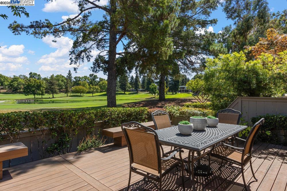 BEST GOLF COURSE VIEW IN CROW CANYON COUNTRY CLUB! 3 FAIRWAYS, LAKE, BRIDGE & FOUNTAIN! GORGEOUS 2 BDRM/2BTH CUSTOM FLOORPLAN W/ DYNAMIC VAULTED CEILINGS, DESIGNER NEUTRALS, MANNING HARDWOOD FLOORS, 4 SKYLIGHTS, ARTIUM REMOVED & ADDED TO LIVING AREA! HUGE COUNTRY WHITE FRENCH KITCHEN FEATURES GARDEN WINDOW, STAINLESS APPLIANCES, KITCHENAID 5 BURNER GAS RANGE TOP, BUILT-IN DESK & BREAKFAST BAR! SPACIOUS PRIIMARY SUITE W/ GORGEOUS GOLF COURSE VIEW, CUSTOM PLANTATION SHUTTERS, VAULTED CEILING, REDESIGNED BATH & WALK IN CLOSET! HALL BATH FEATURES JETTED TUB W/ SHOWER! SEPARATE LAUNDRY RM W/ PANTRY & GARAGE ACCESS! GARAGE HAS ATTIC STORAGE , SINK & CABINETS! LEVEL LIVING RM TO SPACIOUS POLYMER DECK OVERLOOKS THE FABULOUS VIEW ON GOLF COURSE! COMMUNITY POOLS & OPEN SPACE!