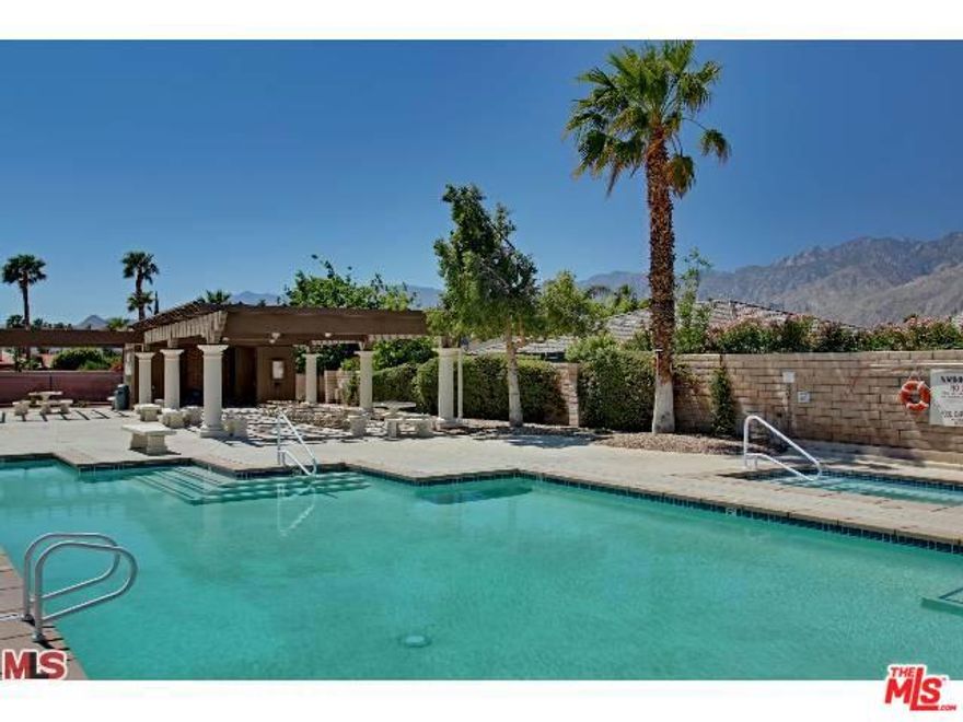 Back on the market. An immaculate three bedroom home that is absolutely move-in ready. Freshly painted, newly carpeted, newer appliances, new garage door, this home is ready to go to one lucky buyer. Set off with low maintenance desert landscaping and the yard boasts grapefruit, fig and apricot trees. The home is done in soothing, neutral desert colors. Shadow Crest is a gated community which not only has a community pool and spa, but they are heated through the use of solar panels.