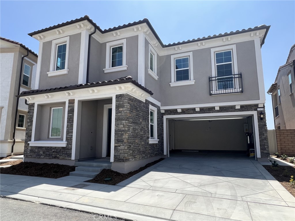 Location!Location! Walnut school district! This brand-new single family residence is in the prestigious Terraces in Walnut, an exclusive 24 hours guarded Gated community with a walking distance to the Marketplace shopping center plaza and many restaurants. Only minutes from the award-winning Walnut High School, this spacious 4-bedroom, 3.5 bathroom home with unobstructed breathtaking hillside views is move-in ready. There is one suite downstairs for guests and big loft upstairs. stainless steel appliances including refrigerator, washer and dryer, Hurry schedule your private tour today!