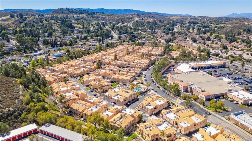 Welcome to this wonderful Santa Clarita gated community located minutes from the 14 freeway. Two bedroom, one bath townhome with a great location in the complex close to the pool with a full size 1-car direct access garage with laundry! Up the stairs to the large family room with fireplace open to an eating area and balcony to kitchen with window for light. Spacious master bedroom with large walk-in closet, a secondary bendroom and bath.

HOA ammenities include a great pool, spa, and greenbelt and street parking if necessary. Complex is located, minutes from the 14 freeway and right next to shopping centers.