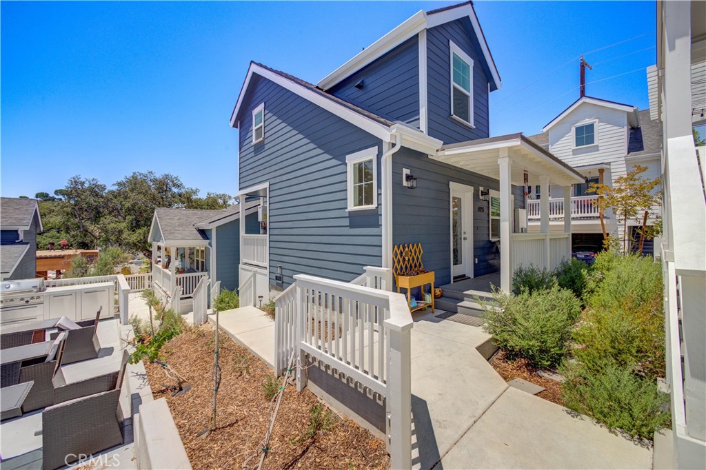 A thoughtfully designed 3-bedroom, 2-bath detached cottage style home in the Grand Oaks Paseo community of Atascadero. Built in 2022, this home blends modern efficiency with warm, inviting style. Inside, you'll find an open layout, vaulted ceilings, quartz countertops, stainless steel appliances, a tankless water heater, and energy-saving LED lighting throughout. Set beneath mature oak trees, this low-maintenance home is ideally located near downtown Atascadero, local restaurants, scenic trails, and the Central Coast's renowned wine country. Whether you're enjoying the peaceful neighborhood or exploring nearby amenities, this home offers a comfortable and convenient lifestyle in one of Atascadero’s thoughtfully planned communities.