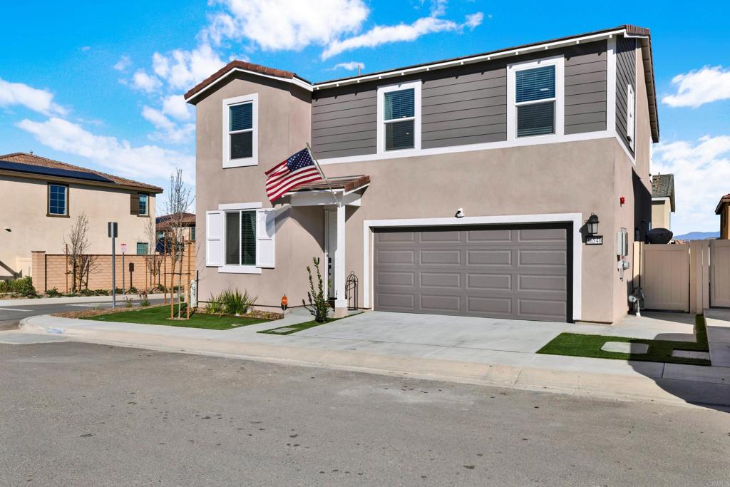 Move right in!! Upgraded and ready for you to enjoy your life!! Enter this 2 story modern home where you will find a full bedroom/office and bathroom downstairs. An open layout with the sparkling kitchen, dining and family room set upon upgraded, luxury vinyl plank flooring. Upstairs you will find an expansive loft surrounded by the primary suite, 2 additional bedrooms, bath and laundry room. Outside please notice the stamped, stained concrete patio with gazebo, complete with misters and smart lights! There is also a dog run and pet grade turf in the front and back yards. If you want more modern finishes you will love the designer entry wall, upstairs barn door, wainscoting in the 2 extra bathrooms, upgraded matte knobs, handles and chandeliers, smart door and smart switches, solar with backup Tesla battery and more!