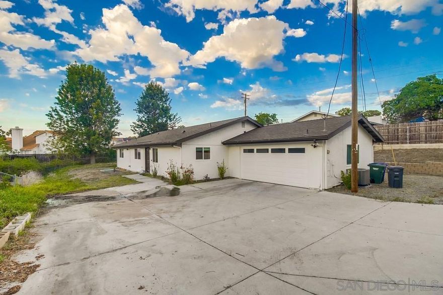 A beautiful gem of a home tucked away in the heart of Lemon Grove. The home was remodeled just 2 years ago and is move in ready. The luxury kitchen is an entertainers delight with island seating and also overlooking the dining area. Step out of the large living room to your private, covered patio. Primary bedroom boasts an ensuite bathroom with duel sinks and walk in shower. Hidden at the back of the home is an extensive patio area currently being used for basketball. There is development opportunity to add a 1100sqft ADU. Plenty of parking for either an RV or or a boat