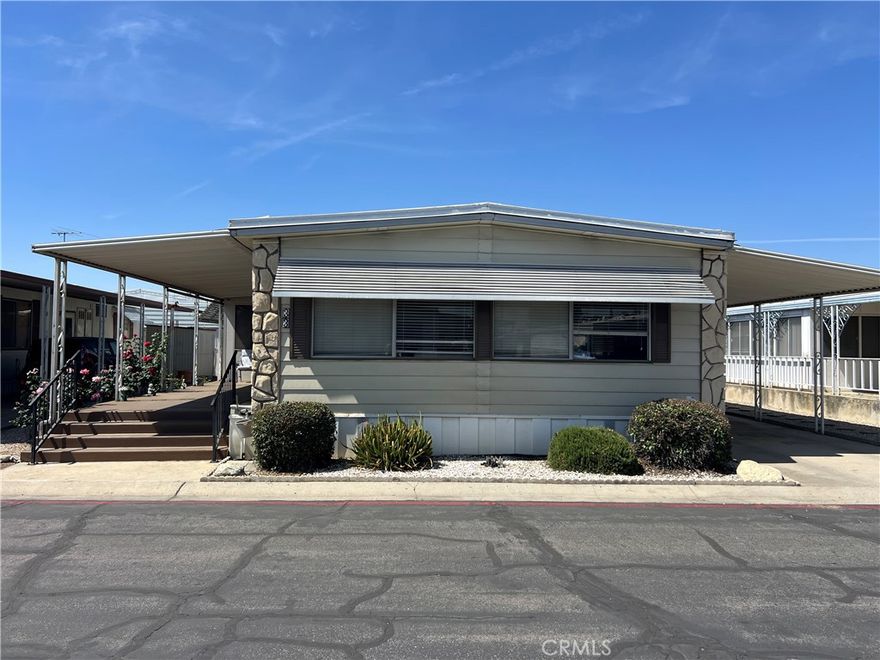 PRICE REDUCED!  This mobile home is in one of the lowest monthly space rent fee, Family/All Ages parks in the area. Located in Crafton Hills Mobile Home Estates, this mobile home is in a great centrally located park, close to the 10 freeway entrance/exit at Yucaipa Blvd. The area is being developed with lots of new eateries and businesses in the area. close to Crafton Hills Community College and to downtown Yucaipa shopping and Restaurants. The mobile home is light and bright with neutral color paint, large oversized windows and an expansive front family room and dining room combo area (dining room has a built in china cabinet and ceiling fan) that would be great for entertaining friends and family. The Kitchen has lots of cabinetry and storage space and is open to another good sized room that could be used for a den or a secondary eating area. Next to the kitchen is also a nice sized bonus room that is being used for storage but could also be used for a patio room to lounge in. The unit has a spacious master bedroom that could fit a king size bed, and en suite bathroom with a large walk in shower. the secondary bedroom is also good sized with a doorway to it's own bathroom as well. THE HOME FEATURES UPGRADED, NEWER CENTRAL AC & HEATING SYSTEM AND NEWER LUXURY VINYL FLOORING THROUGHOUT THE UNIT, and inside laundry room and carport parking with direct access that could accommodate 2 plus cars. There is also TWO small storage sheds that will stay with the unit and a massive concrete front patio area outside the entrance into the main living room and dining room areas. Make your appointment to see this value priced gem as soon as possible.