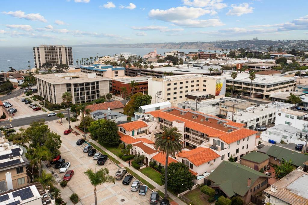 Nestled in the heart of La Jolla Village, this stunning 2-bedroom, 2-bathroom condo at 7757 Eads Avenue offers the ultimate in coastal living, just a couple blocks from the ocean. Located in the boutique La Flor de La Jolla building, this unit boasts brand-new double-pane windows, an open and spacious layout, in-unit laundry, and two secure underground parking spaces, along with extra covered storage off the bedrooms. Built in 1988, the well-maintained complex features gated access, elevator service, and tranquil common areas. Just steps away from top-notch dining, shopping, art galleries, and iconic beaches like La Jolla Cove, this home perfectly combines comfort, convenience, and the charm of one of San Diego's most desirable neighborhoods.