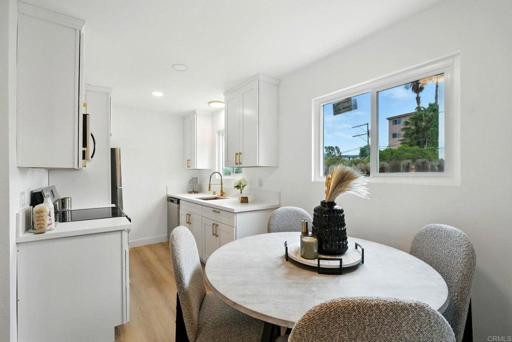 Bright, Modern, and Move-In Ready in San Diego! Step into this beautifully updated 1-bedroom, 1-bath condo located on the ground floor of a secure, gated community in the heart of San Diego. This home features brand-new flooring, fresh paint, and an open-concept layout filled with natural light—perfect for both relaxing and entertaining. The stylish kitchen offers modern cabinetry, a gas range, and a built-in microwave for convenient cooking. Enjoy peace of mind with assigned off-street parking, on-site laundry, and low HOA dues. Whether you're a first-time buyer or investor, this unit offers incredible value and location. Just minutes from SDSU, Downtown, and North Park, with easy access to shopping, schools, public transit, and major freeways—everything you need. Don’t miss this opportunity to own a turnkey condo in one of San Diego’s most central neighborhoods!