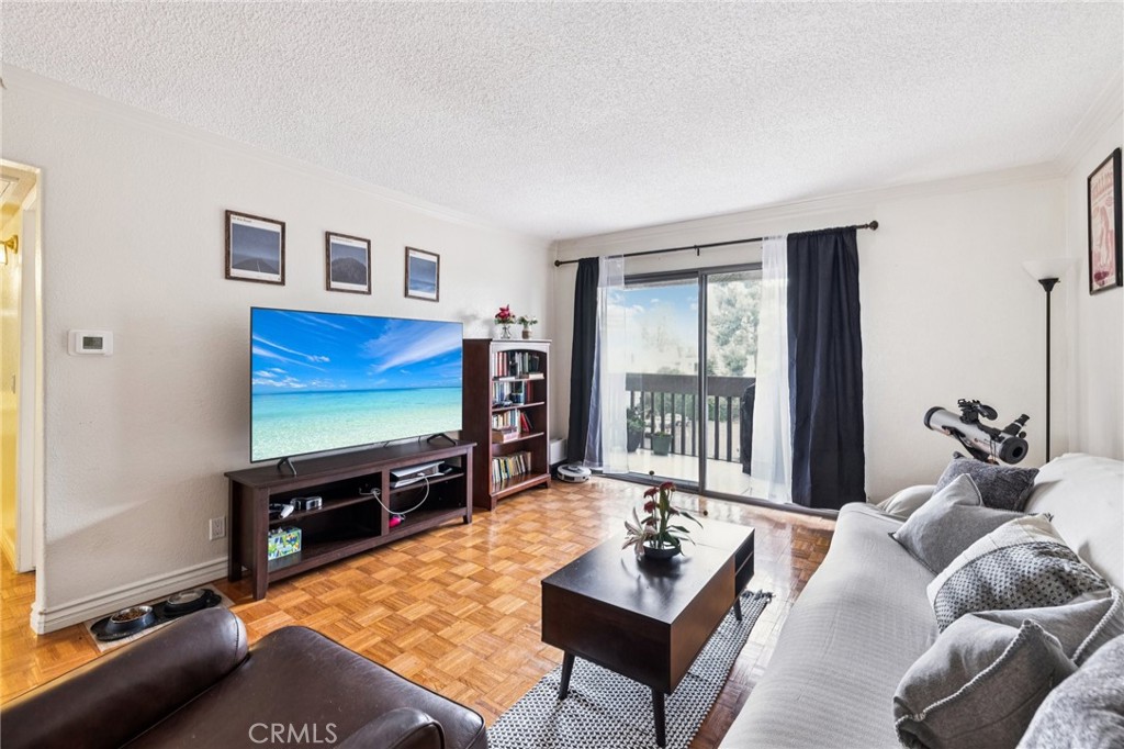 PROPERTY QUALIFIES FOR 5.87% Rate OR $15,000 Grant! Welcome to your light-filled upper-level condo in a prime location! This Move-in Ready 1-bedroom, 1-bathroom home is near the new Monterey Park Marketplace close to shops and restaurants, This home offers an open-concept floor plan, abundant natural light, original hardwood flooring, Central AC and Heat, New HVAC System only 2 years old, Dishwasher and Newer large Sink! Step into the spacious living room, where a private balcony creates the perfect space to relax or enjoy your morning coffee. Located in a highly desirable and well-maintained community, residents enjoy resort-style amenities including a sparkling swimming pool, spa, and a fully equipped fitness center. This is your chance to own a move-in ready home in an area known for its charm, walkability, and easy access to shopping, dining, and freeways. Whether you're a first-time homebuyer, downsizing, or looking for an investment, this turnkey condo checks all the boxes!