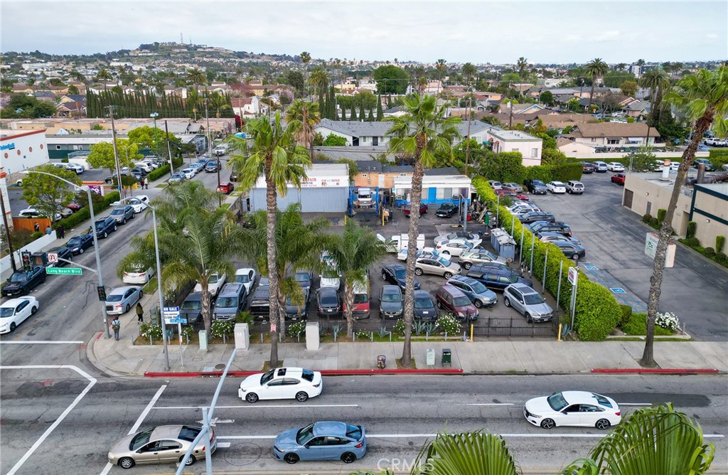 This high visibility corner lot situated in a sought-after redevelopment zone along the A Line corridor, offers excellent potential for a wide range of uses. Currently operating as an auto repair business, the spacious lot consists of two structures and ample parking within a secure, fenced yard. Zoned LBPD29 and located within the Midtown Specific Plan (SP1CDR), this location provides endless possibilities for future development or repurposing. Whether for commercial, retail, or mixed-use endeavors, this property is an ideal investment in an area poised for growth.
