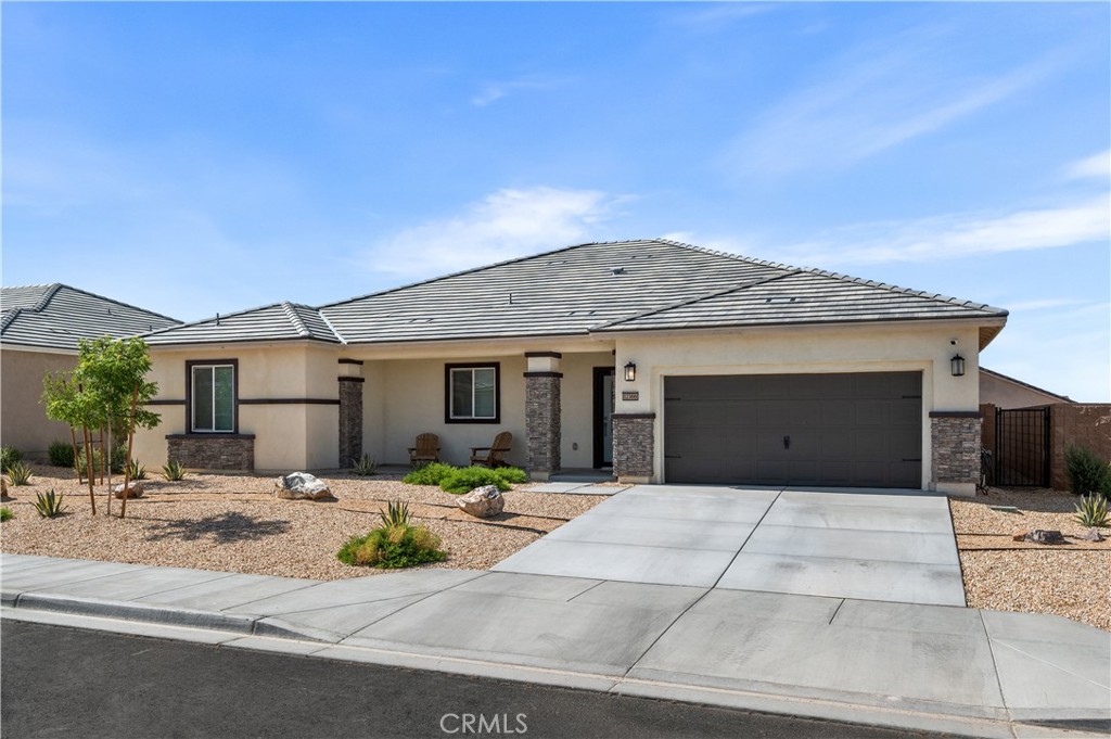 BACK ON THE MARKET! Welcome to this stunning 5-bedroom, 3-bathroom home in a newly developed neighborhood of Victorville, CA. Built in 2023, this modern residence offers 2,549 sq.ft. of living space on a 7,519 sq.ft. lot, and is in amazing condition—ready for you to move right in.
Step into a bright and airy home featuring a great open layout that seamlessly connects the spacious living, dining, and kitchen areas—perfect for both everyday living and entertaining. The kitchen boasts contemporary finishes, ample cabinetry, and a large center island ideal for gathering.
With five well-sized bedrooms, including a luxurious primary suite, there's room for everyone to enjoy their own space. Each bathroom is stylishly appointed with modern fixtures and finishes.
Located in a quiet, newly developed community, this home offers the perfect blend of comfort, space, and modern convenience. Don’t miss the opportunity to own this like-new home in one of Victorville’s growing neighborhoods!