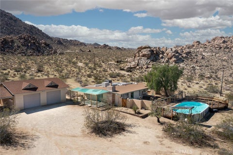Photo of 66239 Serrano Road, Joshua Tree, CA 92252 (MLS # JT26219395)