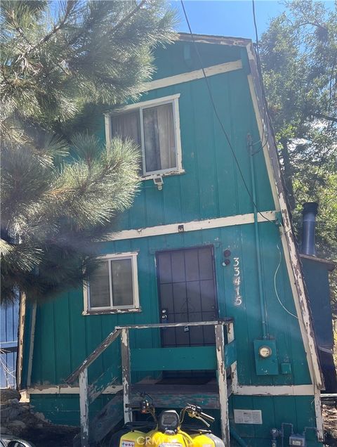 Photo of 33415 Cedar Dr Dr, Running Springs, CA 92382 (MLS # DW25221392)