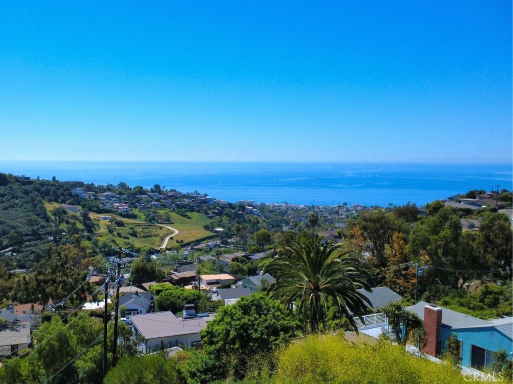 Photo of 1550 Bluebird Canyon Drive, Laguna Beach, CA 92651 (MLS # OC26028205)