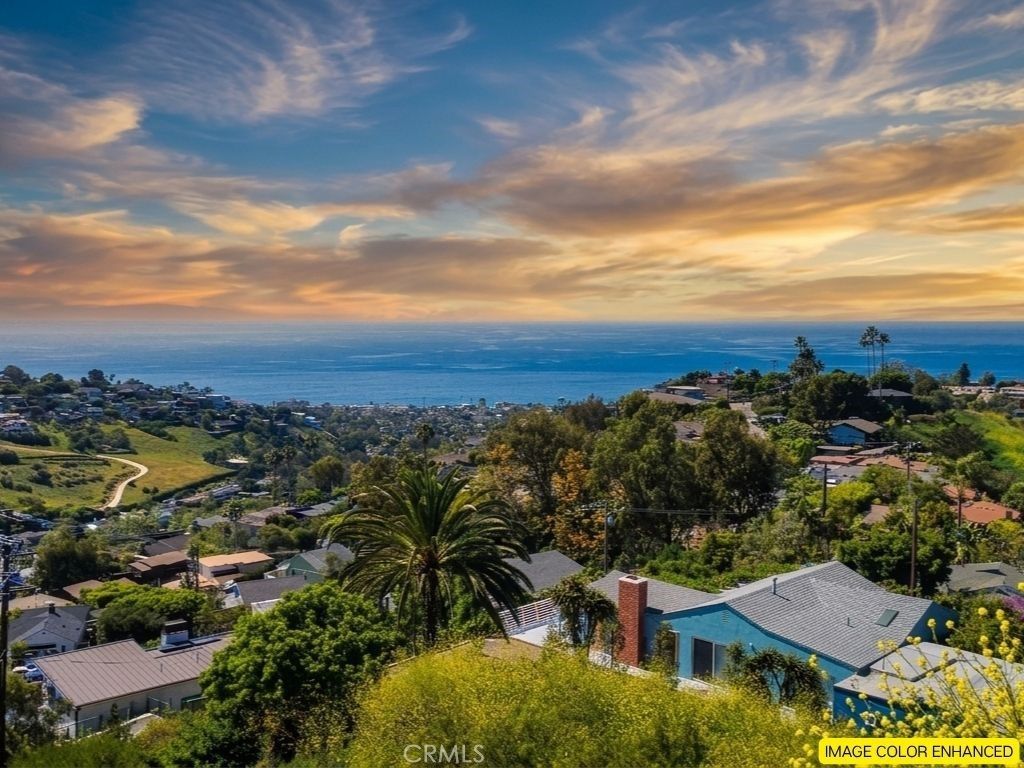 Photo of 1550 Bluebird Canyon Drive, Laguna Beach, CA 92651 (MLS # OC26028205)