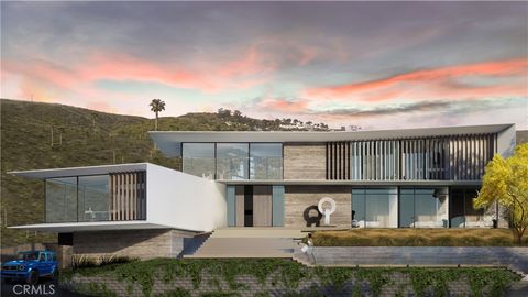 Photo of 1550 Bluebird Canyon Drive, Laguna Beach, CA 92651 (MLS # OC26028205)