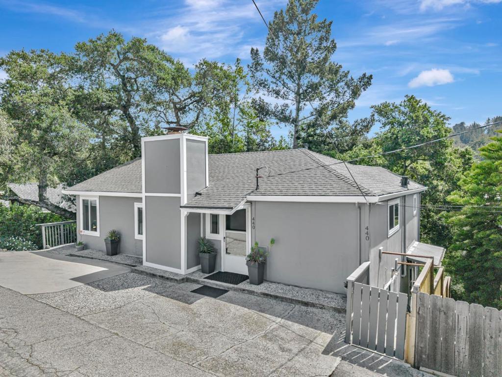 Situated in the highly sought-after Bethany Park neighborhood of Scotts Valley, this exceptional property is nestled among the trees, offering a unique blend of suburban living, convenient access to the coast, and Silicon Valley's technology hub. Ideally located just minutes from Vine Hill Elementary School, adjacent to the Glenwood Open Space Preserve, and merely a mile from Highway 17, this residence presents a remarkable opportunity. The property features an impressive, fully remodeled 3-bedroom, 1-bathroom home with a private, lower-level in-law unit, connected to city water and sewer. Additional features include a spacious two-car driveway, and street parking. The in-law unit boasts an expansive 800 Sq Ft, fully remodeled unit, complete with 1 bedroom and 1 bathroom. Notably, this property continues to thrive as a successful five-star executive AirBnB for the past 4 years.