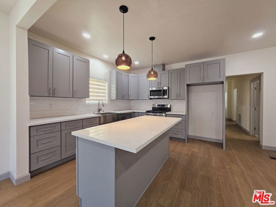 *NEWLY REMODELED* BE THE FIRST to live in beautifully built modern unit! This unit boasts an open concept kitchen and living room with large island that serves as a breakfast area. The unit is finished with premium materials and upgraded electricity and plumbing. Comes fully equipped with new appliances. Property is secured by metal gate and CCTV.