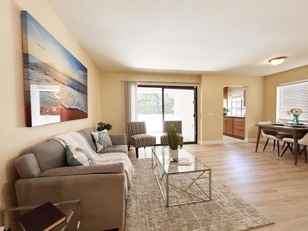 Downstairs 2 bed 2 bath condo located in the secluded area in the complex. Newly installed flooring, New blinds, New stove and freshly painted throughout.Washer and dryer provided in the hall closet. Convenient location to all and is in prestigious Poway school district. HOA fee includes water .