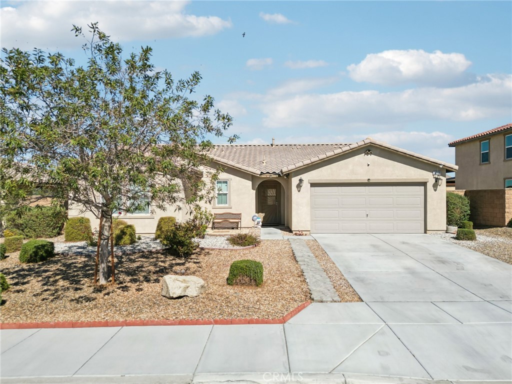 Welcome to your dream home in the desirable Las Hacendas neighborhood of Victorville! This stunning residence features 4 bedrooms, including an optional office/bedroom, and 2 bathrooms, all spread across a generous 1,858 sqft of living space on a spacious 7,245 sqft lot. The open space concept creates a warm and inviting atmosphere, perfect for family gatherings and entertaining. Enjoy the beautiful outdoor area with a front and rear patio, complemented by 25 tons of pea gravel and stepping stones in the backyard, along with a drip irrigation system and pads ready for your BBQ and gazebo. The home also boasts a practical 10x12 ft shed for extra storage and ample space for your RV, boat, or other recreational toys. Inside, you'll find modern LED lighting, elegant mosaic tile features, and ceiling fans in every bedroom for comfort. The kitchen is a chef's delight, showcasing granite countertops and a spacious 10x6 island, while the bathrooms feature luxurious marble countertops, with the primary bath offering double sinks. This home is ready for you to make it your own, providing plenty of opportunities to add your personal touch. Schedule a visit today and imagine the endless possibilities!