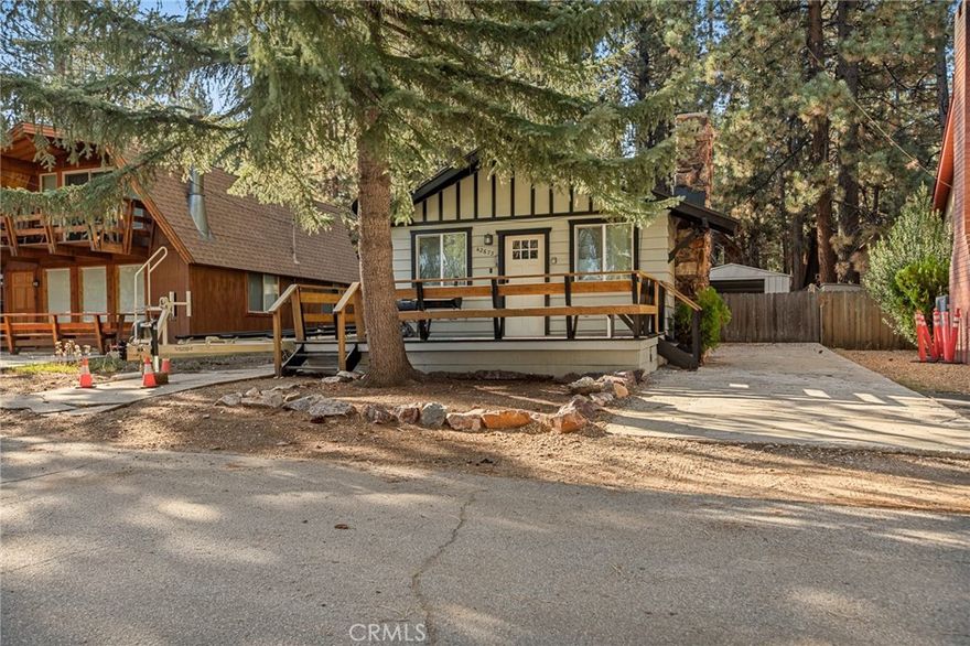 Welcome home to this newly updated lower Moonridge gem. Recently remodled/updated in 2023 with kitchen cabinets and quartz countertops, stainless steel kitchen sink, new vinyl flooring throughout, new paint and baseboards -- new bathroom vanity with quartz countertop and tiled walk-in shower -- updated plumbing/drains, electrical, tankless water heater, roof and more. The open concept kitchen, eat-at-island and living room will meet all your needs. The backyard has plenty of room for outdoor living with an above ground spa. Plus, there's a large shed/workspace/garage for all your storage needs. In addition, the property is walking distance to ski resort parking/shuttle lot, the zoo and all of Moonridge's restaurants and businesses. Don't let this opportunity pass you by!