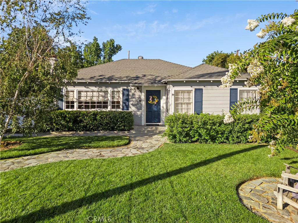 **CHARMING RANCH COTTAGE IN RIVERSIDE’S ICONIC WOODSTREETS HISTORIC NEIGHBORHOOD**
Step into timeless elegance with this beautifully maintained late 1940s Single story cottage nestled in Riverside’s prestigious Wood Streets historic district. This classic home seamlessly blends vintage charm with modern updates, offering the perfect sanctuary for today’s lifestyle. Extra-deep driveway leads to detached rear garage for ultimate privacy. Low-maintenance backyard paradise with mature landscaping. Stunning variety of established trees including white birch and myrtle. Classic white picket fence frames the property. Charming walkway guides guests to the welcoming front entrance.
Original walnut-colored hardwood floors throughout create warmth and character. Bright, airy interior with excellent natural light, Formal dining room perfect for entertaining, Separate formal den and living room areas provide versatile living spaces, Updated kitchen features breakfast nook and convenient pantry storage.
Three well-appointed bedrooms including an extra-large master suite, Two full bathrooms which includes a luxurious master en suite bathroom with walk-in shower, Walk-in closet and separate dressing room area - a rare find in Wood Streets homes, thoughtful layout maximizes both privacy and functionality
This exceptional property offers the rare opportunity to own a piece of Riverside history while enjoying modern conveniences. The Wood Streets neighborhood is renowned for its tree-lined streets, architectural significance, and strong sense of community. Don’t miss this chance to call this historic gem home.