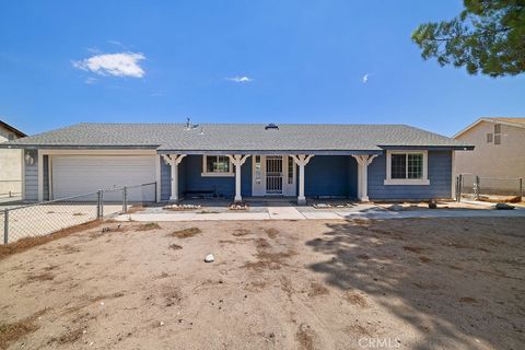 Photo of 12867 Banyon Tree Lane, Victorville, CA 92392 (MLS # HD25177089)