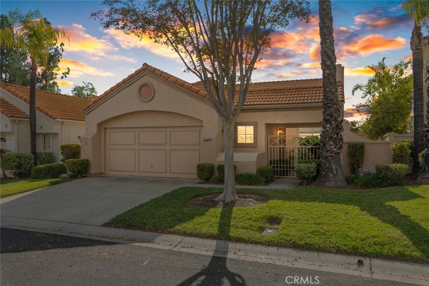 Welcome to 40493 Via Estrada, located in the highly desirable 55+ gated community of The Colony in Murrieta. This charming single-story original owners home offers approx 1,614 square feet of comfortable living space with 2 bedrooms plus a den, ideal for an office, hobby room, or potential 3rd bedroom. The open and inviting floor plan features laminate flooring, carpet in the bedrooms, and a cozy fireplace in the living room. The spacious primary suite includes a glass slider leading to a private patio, perfect for morning coffee or evening relaxation. Additional highlights include new water heater, new garbage disposal, new faucets, updated kitchen appliances and includes refrigerator!. 2-car garage, recently serviced AC system, low-maintenance backyard, HOA maintains the front, and low property taxes!
The Colony offers a resort-style lifestyle with a beautiful clubhouse featuring a fitness center, library, billiards, card and craft rooms, auditorium, swimming pool, spa, and tennis and pickleball courts. Residents enjoy an active social calendar with a variety of clubs, classes, and community events. The HOA maintains all common areas and front lawns, provides 24-hour guarded gate security, and ensures a beautifully landscaped, well-kept environment. Golf enthusiasts will appreciate the California Oaks Golf Club within the community, offering a scenic, tree-lined course just steps from home (membership and public play available separately).
Conveniently located near shopping, dining, hospitals, and freeway access, this home combines comfort, convenience, and community in one of Murrieta’s most sought-after 55+ neighborhoods.